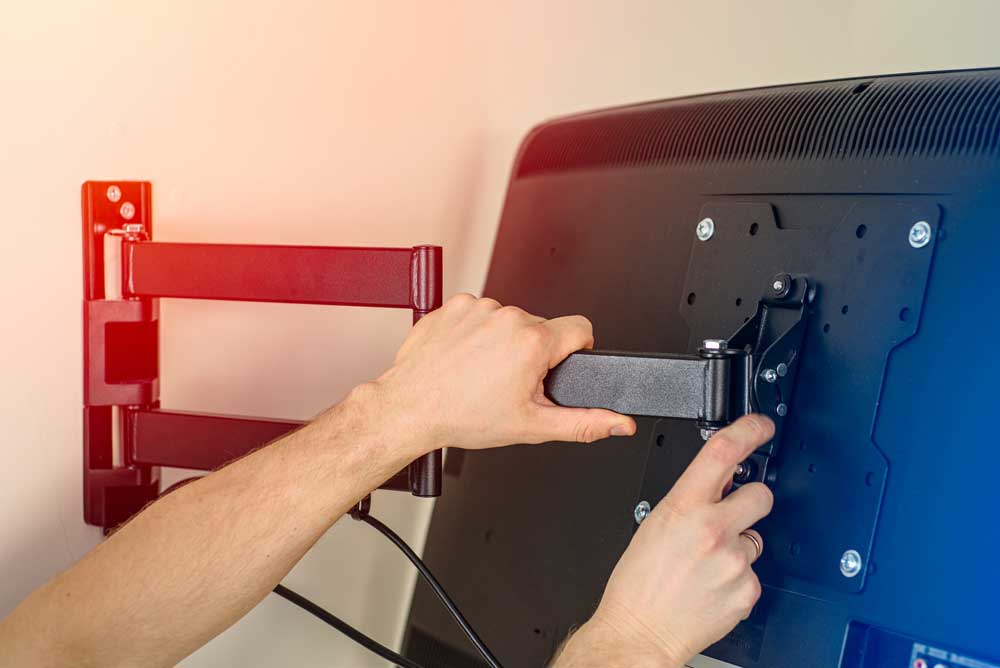 tv-mount AC Spotless Solutions installing wall TV mount